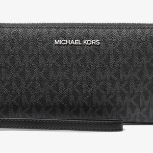 MK Women’s Large Signature Continental Travel Wristlet Wallet in Black Noir.